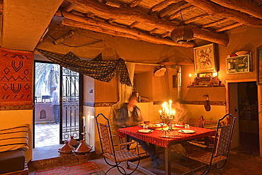 Dinning room at Kasbah Tebi, guest house in the heart of the Ksar of Ait-Ben-Haddou, Ounila River valley, Ouarzazate Province, region of Draa-Tafilalet, Morocco, North West Africa