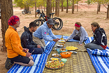 Lunch break, group of bikers, road from Telouet to Tighza, Ouarzazate Province, region of Draa-Tafilalet, Morocco, North West Africa