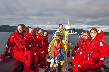 Group ready for Artic bathing with survival suit. Senja island.County of Troms,Norway,Northern Europe