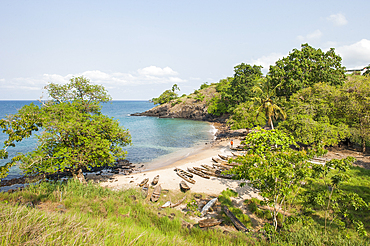 Fisherman's pirogues on a beach of the north coast of Sao Tome Island, Republic of Sao Tome and Principe,Africa