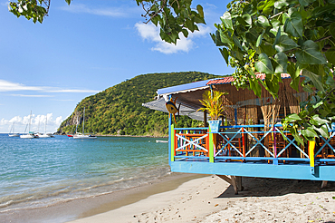 Cafe restaurant terrace on stilts, village of Deshaies, Basse-terre, Guadeloupe, overseas region of France,Leewards Islands, Lesser Antilles, Caribbean