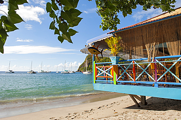 Cafe restaurant terrace on stilts, village of Deshaies, Basse-terre, Guadeloupe, overseas region of France,Leewards Islands, Lesser Antilles, Caribbean