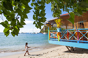 Cafe restaurant terrace on stilts, village of Deshaies, Basse-terre, Guadeloupe, overseas region of France,Leewards Islands, Lesser Antilles, Caribbean