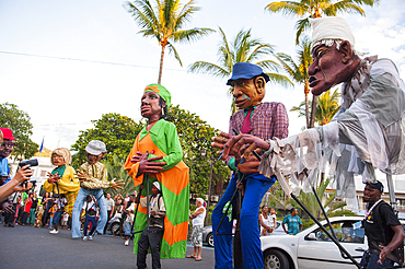 Giant puppets parade of The Giant Match Association at the Tempo festival of Saint-Leu,Reunion island,overseas departement of France,Indian Ocean