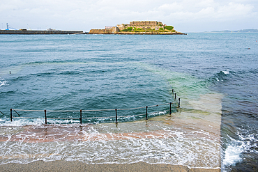 La Vallette Bathing Pools with Castle Cornet in the background, St Peter Port, Guernsey Island, Bailiwick of Guernsey, United Kingdom