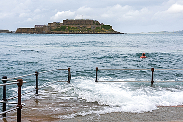 La Vallette Bathing Pools with Castle Cornet in the background, St Peter Port, Guernsey Island, Bailiwick of Guernsey, United Kingdom