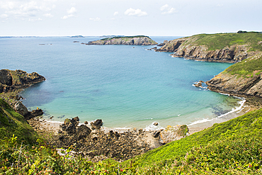 Grande Greve Bay viewed from La Coupée with the Brecquou island in the background, the narrow isthmus which links Greater and Little Sark, Sark island, Channel Islands, Bailiwick of Guernsey, United Kingdom