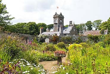 The walled garden with the house in the background, La Seignerie (17th Century), traditional residence of the Seigneur of Sark, Open to the public for the visit of the gardens, Sark island, Channel Islands, Bailiwick of Guernsey, United Kingdom