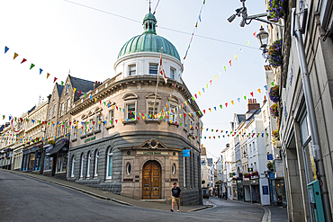 Remarkable building, with a copper dome, at the intersection of High Street and Smith Street, St Peter Port, Guernsey Island, Bailiwick of Guernsey, United Kingdom