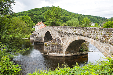Medieval bridge of Menat across the River Sioule, Puy-de-Dome department, Auvergne-Rhone-Alpes region, France, Europe