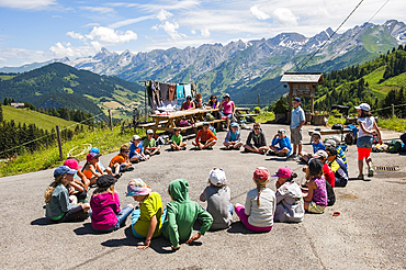 Children's dance in front of the Corbassieres Farm,Beauregard Range,La Clusaz,Haute-Savoie department, Rhone-Alpes region, France, Europe