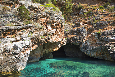 Cave in Dafines bay, Peninsula of Karaburun, within the Karaburun-Sazan Marine Parc, Vlore Bay, Albania, Europe