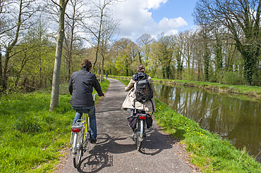 Bike ride on the bank of the Nantes-Brest canal, around Pontivy, Morbihan department, Region of Brittany,France,Europe