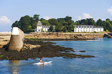 Kayak in front of Tristan Island off Douarnenez,Finistere department,Brittany region,west of France,western Europe