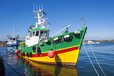 Sardine fishing boat alongside a quay at Port of Rosmeur,Douarnenez,Finistere department,Brittany region,west of France,western Europe