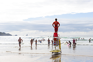 Swimmers and surf-riders are protected by a team rescue of the SNSM French organisation,beach of the Baie des Trepasses or Bay of Dead located between the Pointe du Raz and the Pointe du Van,Cap Sizun,Finistere department,Brittany region,west of France,we