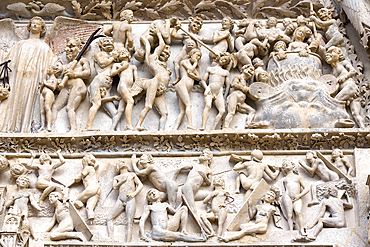 The punishment of sinners depicted on the Tympanum over the Central portal of the west facade, Saint Stephen Cathedral, Bourges, Cher department, Province of Berry, Centre-Val de Loire region, France