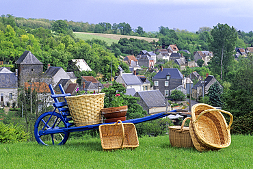 Wicker basket display with the village of Villaines-les-Rochers in the background, Indre-et-Loire department, Centre region, France, Europe