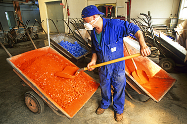 Wheelbarrow of cullet, scrap crystal from faulty pieces, it is sorted, cleaned, and melted down again, Cristalleries Royales de Champagne,crystal glass-making factory of Bayel,Aube department,Champagne-Ardenne region,France,Europe
