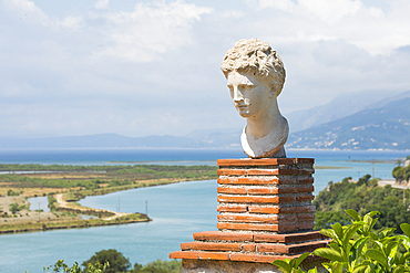 Copy of the head of the Goddess of Butrint in the precinct of the Acropolis of the Archaeological site of Butrint, Butrint National Park, UNESCO World Heritage Site, near Saranda, on the Ionian coast, Albania, Europe