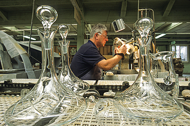 Cutting crystal carafes,Hartzviller Crystalworks,Moselle department,Lorraine region,France,Europe