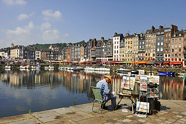 Painter at Honfleur harbour,Calvados department,Lower Normandy region,Northwestern France,Western Europe