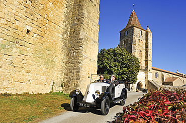 Drive with an open touring vintage car (Renault of 1925) at Lavardens,Gers department, Occitanie region, southwest of France,Europe