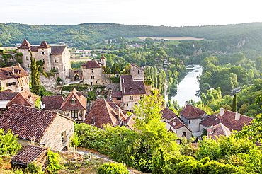 Village of Saint-Cirq-Lapopie, one of the ' Plus Beaux Villages de France' (the most beautiful villages of France), overlooking the Lot River, Lot department, region of Midi-Pyrenees, Occitanie, southwest of France, Europe