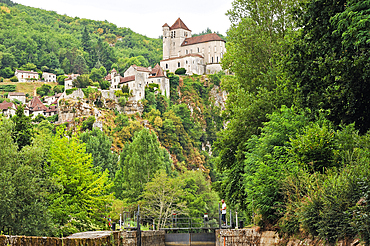 Locks on Lot River at the foot of Saint-Cirq-Lapopie, one of the ' Plus Beaux Villages de France' (the most beautiful villages of France), Lot department, region of Midi-Pyrenees, southwest of France, Europe