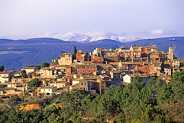 Roussillon, one of The most beautiful villages of France, with the Mont Ventoux in the background, Luberon Massif, Vaucluse department, Provence-Alpes-Cote d'Azur region, southeastern France, Europe