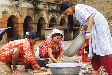 Washing-up at the water fountain,Bungamati village of Kathmandu valley,Lalitpur District,Nepal,Himalaya,South Asia