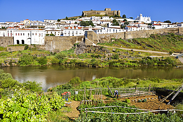 City of Mertola above the Guadiana River viewed from the opposite bank, Alentejo region, Portugal, southwertern Europe