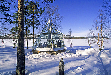 Modern Helmi glass kota (Lapp tepee), Design House Idoli by the Inari lake,Lapland,Finland, Northern Europe