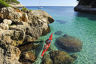 Kayak in Mitjana creek near Cala Galdana, South Coast of Menorca, Balearic Islands, Spain, Mediterranean, Europe