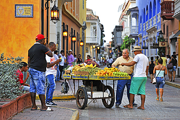 Street vendor of fruits inside the downtown colonial walled city, Cartagena, Colombia, South America