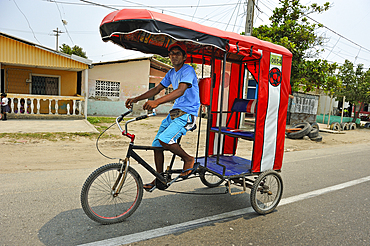 Rickshaw in a village traversed by the causeway near Cienaga, department of Magdalena, Caribbean Region, Colombia, South America