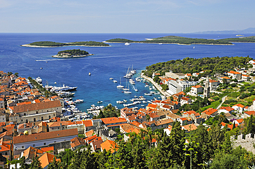 View over Hvar city from the fortress with Hell's Islands (Pakleni) in the background, Hvar island, Croatia, Southeast Europe