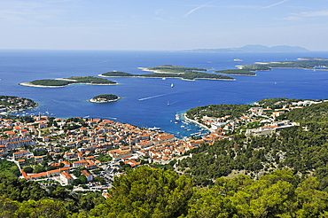 View over Hvar city from the fortress Napoleon with Hell's Islands (Pakleni) in the background, Hvar island, Croatia, Southeast Europe