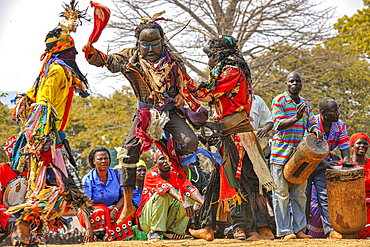 Masked dancers, The Kulamba Traditional Ceremony of the Chewa people from Zambia, Mozambique and Malawi, held annually on the last Saturday in August to pay homage to their Chief Kalonga Gaia Uni, held near Katete, Eastern Province, Zambia, Africa