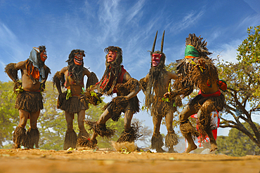 Masked dancers, The Kulamba Traditional Ceremony of the Chewa people from Zambia, Mozambique and Malawi, held annually on the last Saturday in August to pay homage to their Chief Kalonga Gaia Uni, held near Katete, Eastern Province, Zambia, Africa