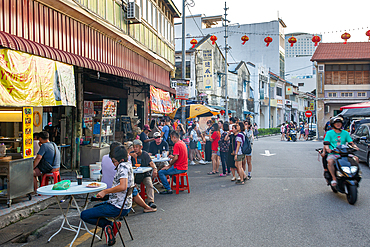 Unidentified people on Kimberley Street in George Town, Penang, Malaysia, Southeast Asia, Asia