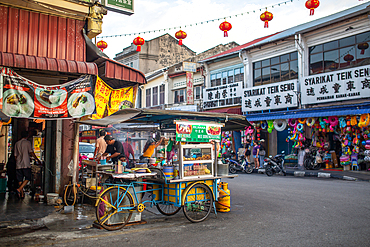 Unidentified people on Kimberley Street in George Town, Penang, Malaysia, Southeast Asia, Asia