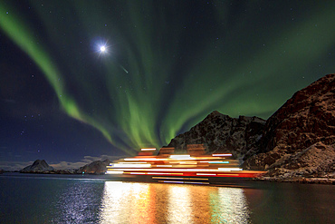 Hurtigruten postal ship with northern lights., Norway.
