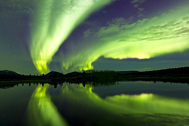 Aurora borealis over Fish lake, Whitehorse, Yukon, Canada.