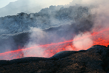 November 2006 - Lava flow during eruption of Mount Etna volcano, Sicily, Italy.