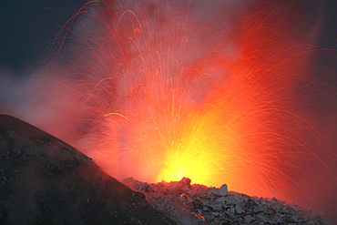 December 11, 2005 - Nighttime eruption of Santiaguito dome complex, Santa Maria volcano, Guatemala.