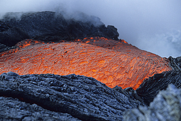 Lava flowing into sea, Kilauea volcano, Big Island, Hawaii.