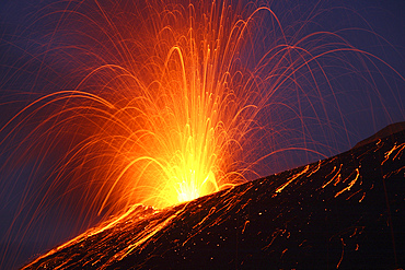May 20, 2008 - Lava bomb trajectories visible during nighttime vulcanian eruption of Anak Krakatau volcano, Sunda Strait, Java, Indonesia.