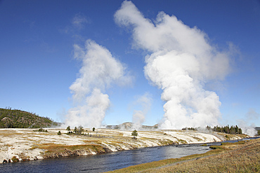 September 12, 2009 - Steam rising over Midway Geyser Basin geothermal area, Yellowstone Caldera, Yellowstone National Park, Wyoming.