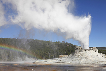 September 12, 2009 - Castle Geyser eruption with rainbow, Upper Geyser Basin geothermal area, Yellowstone Caldera, Yellowstone National Park, Wyoming.